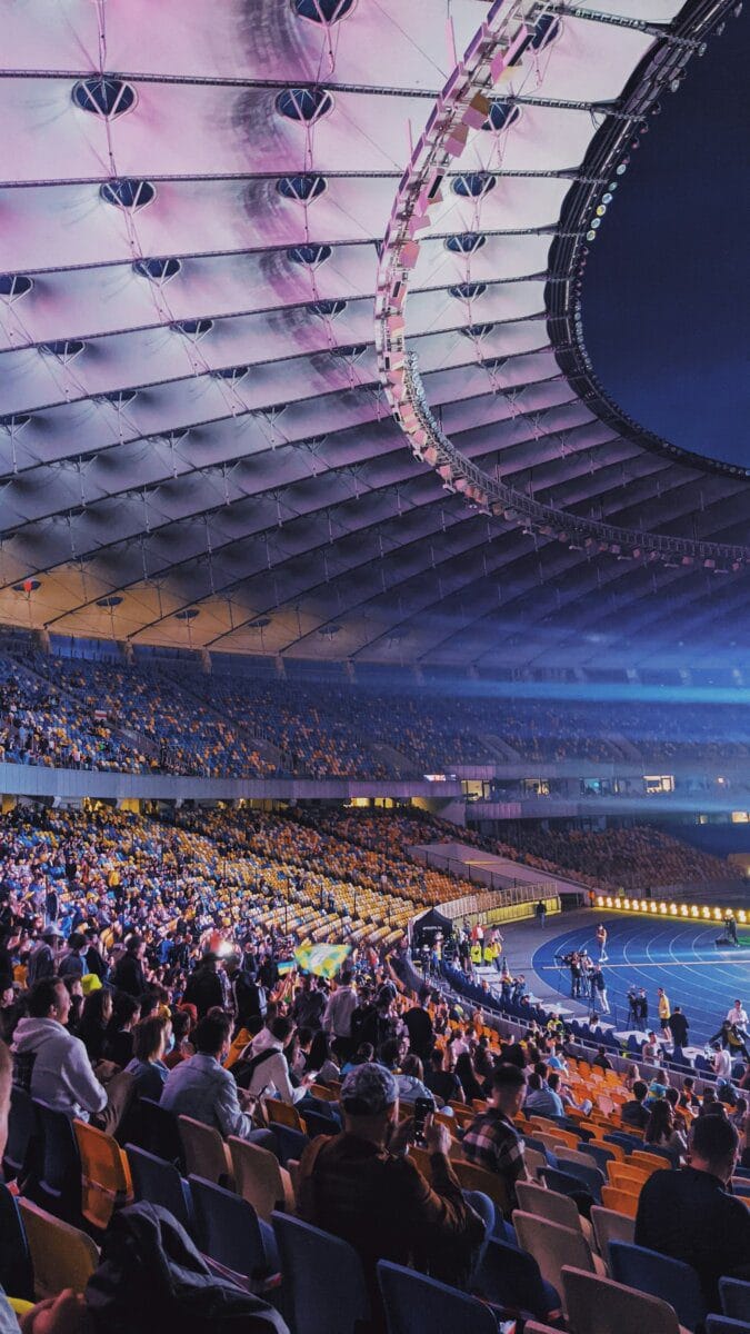 Crowd at a stadium concert at night