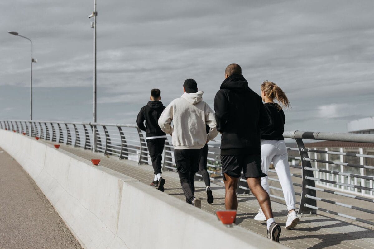 A group of people jogging together in a line