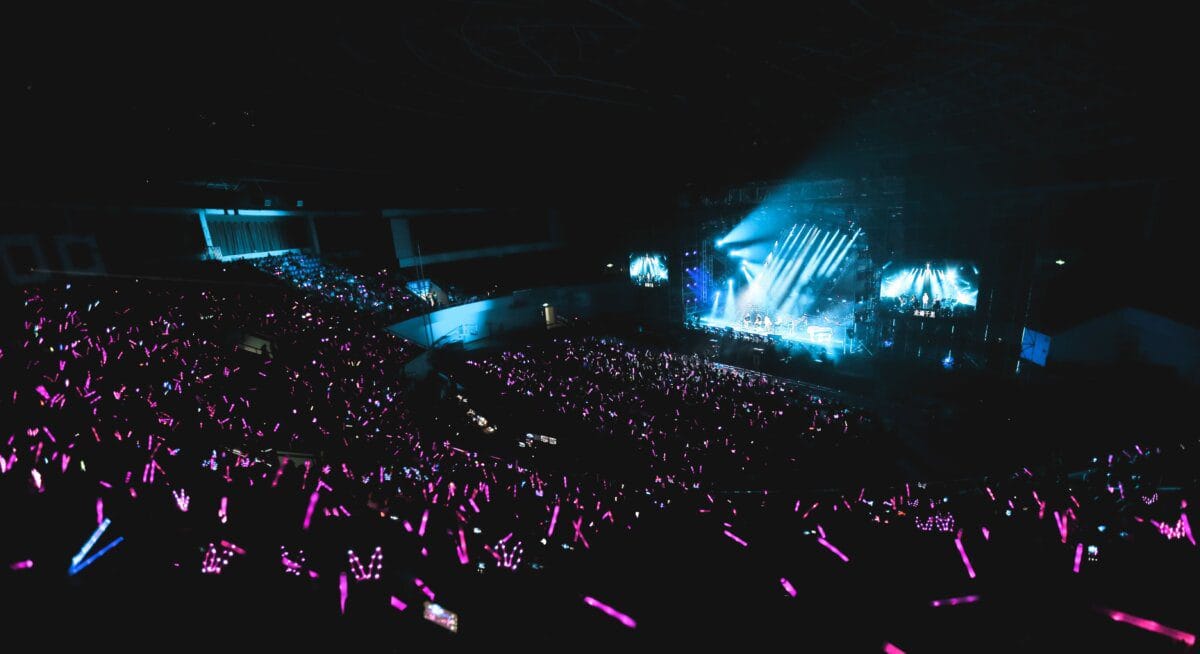 Blue stage lighting at a concert venue